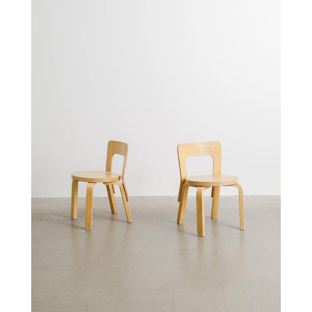 A rare pair of vintage alvar aalto "n65" children chairs in benct laminated birch wood with matching patina produced by...