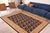 "Enhance the ambiance of your home with this magnificent Persian-influenced Turkish hand-knotted rug made by skilled...