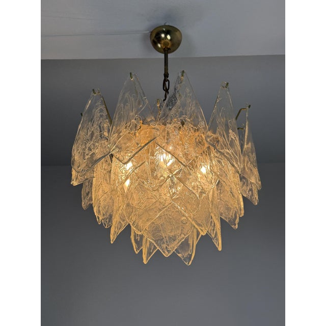 7-light la murrina murano glass chandelier, 1970s each individual glass is stamped with the "m" "la murrina" stamp. brass...