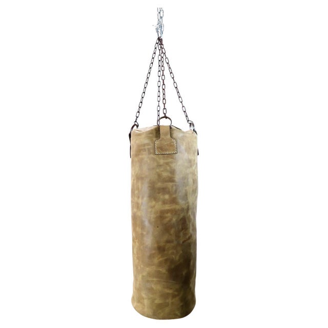 We offer this Leather Gym Punching Boxing Heavy Bag. This piece is made of vintage leather and vintage chains following...