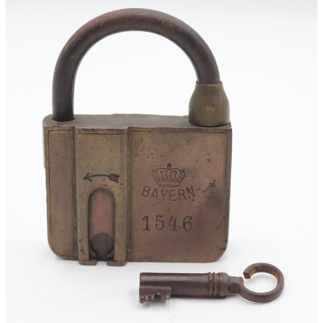 Antique brass Bavarian lever padlock with a crown emblem and the word "Bayern", which translates to "Bavaria" in German....