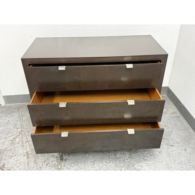Design Plus Gallery presents a Contemporary Chest of Drawers from Traylor & Co. The chest has a rectilinear silhouette...