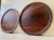 A pair of 29 cm circular tray in molded rosewood veneer. Made in Scandinavia during the 1960s, probably by Åry Denmark and...
