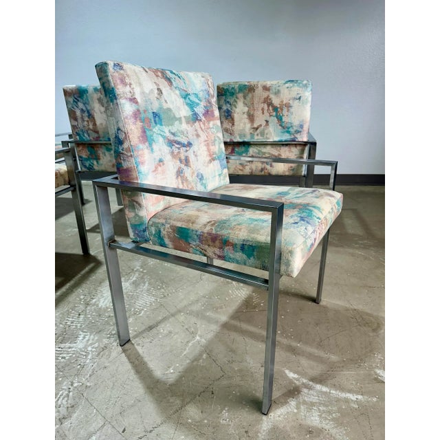 Set of 6 Mid Century Modern Dining Armchairs in Brushed Chrome with upholstered seats. Purchased from original owners as...