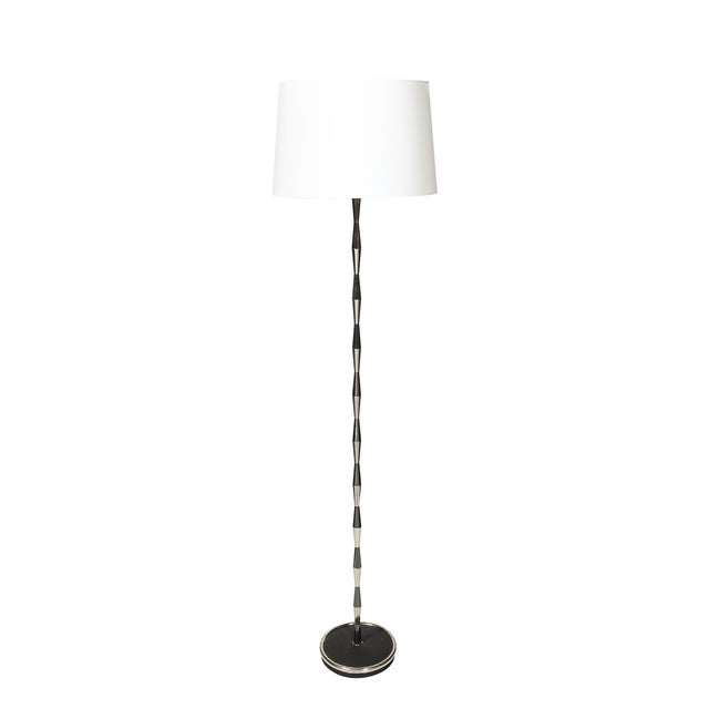 This exceptional pair of floor lamps, designed by the renowned Italian architect and designer Gio Ponti, exemplifies the...