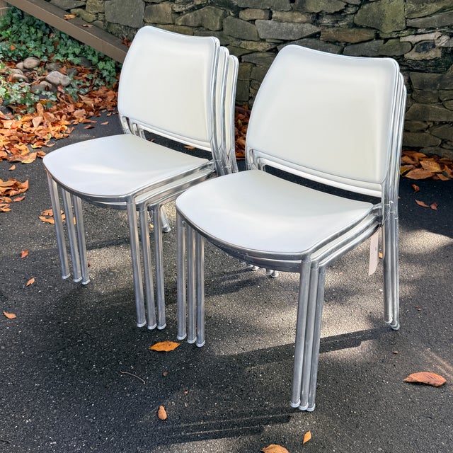 Set of 6 STUA Stackable GAS Chair by Jesús Gasca A light aluminum frame with molded white seats and backs. Stackable and...