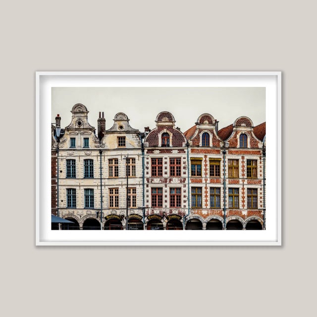 An architectural study of five adjoining houses in the northern French town of Arras. They stand along Place des Héros,...