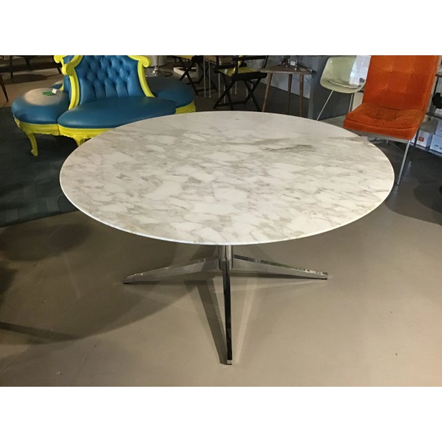 Designed by Florence Knoll in the 1960's, this sleek, modern dining table has a steel chrome plated base and gorgeous...