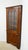 Corner Cabinet by Stickley. Store item # 549. It features adjustable shelves behind the glass door and interior lights.