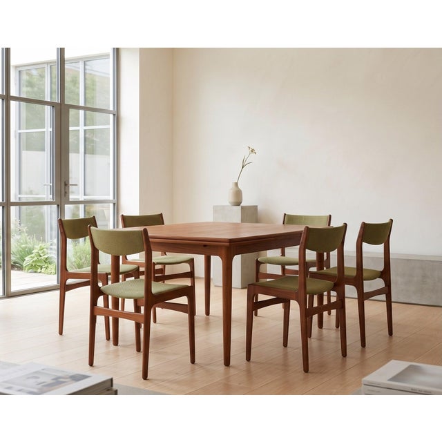 Elegant set of six Danish teak dining chairs attributed to Erik Buch and produced in the 1960s. Featuring a light and...