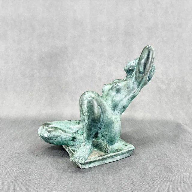 Unique Art Deco statue of a nude in patinated bronze.