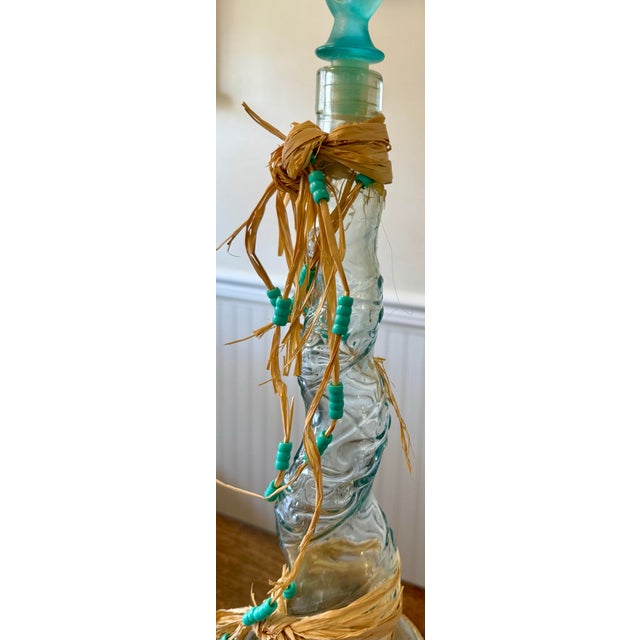 The wine chiller is made of terracotta clay with hand glazing in teal and has a beautiful cluster of grapes on front. This...