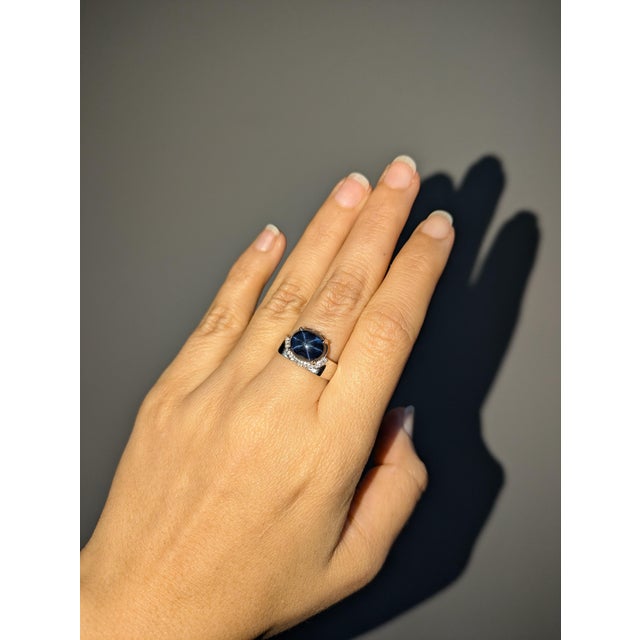 This lovely 6.15 carat star sapphire ring is made in solid 14k gold with natural earth mined diamonds in solid 14k gold....