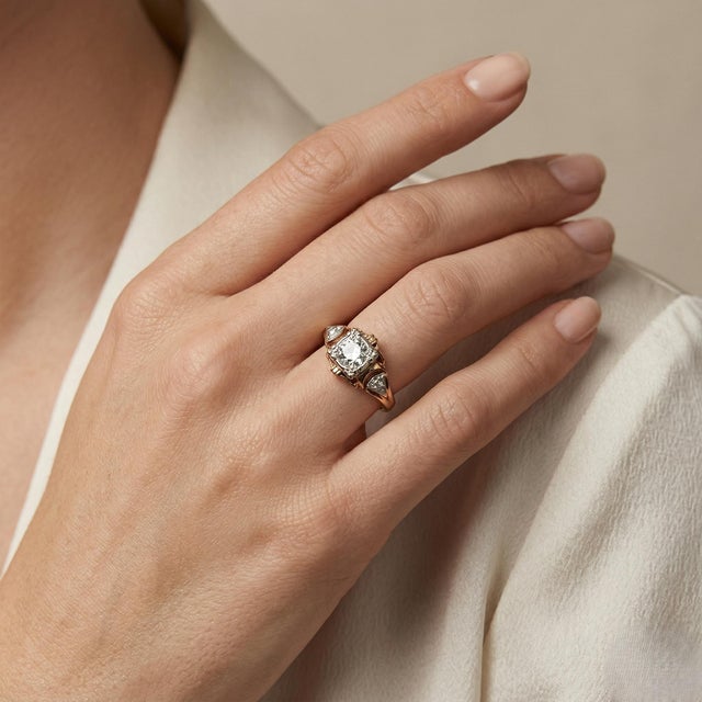 Discover timeless elegance with this exquisite antique diamond ring, crafted in a stunning combination of 14k yellow and...