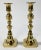 Pair of antique 19th C English brass candlesticks featuring elegant inverted beehive form. Each holds a single taper....