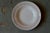 These beautiful soup plates, made by the Gien faience factory in the 1950s, are decorated with colorful circles. The set...