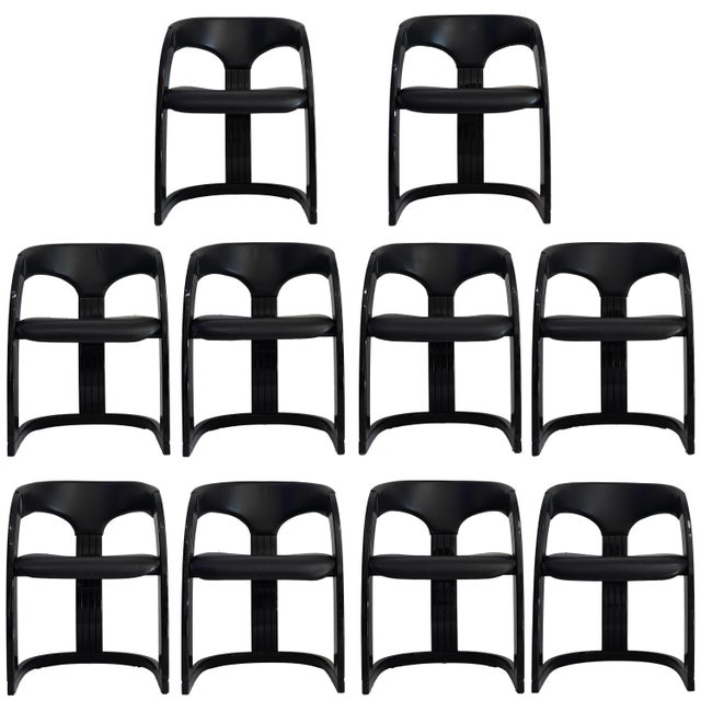 Mid 20th century Italian black lacquered chairs with goatskin leather seats. Quintessential postmodern design and timeless...