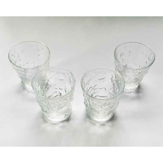 A set of four pressed lowball glasses. Ships within 1-2 days using USPS. All items packed with care. Please contact us...