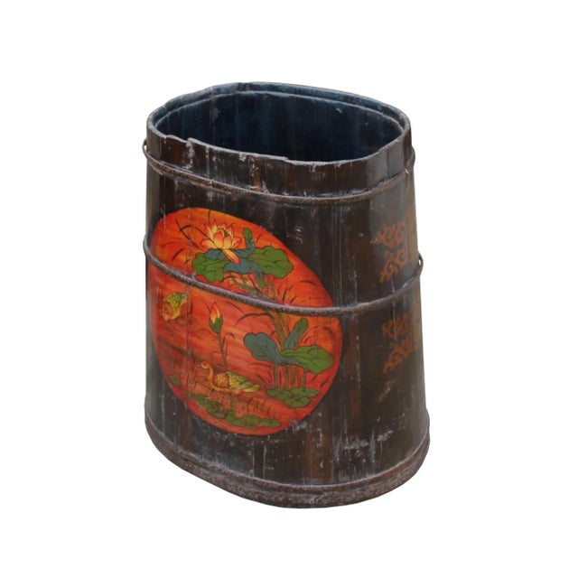This is a handmade Chinese accent decorative bucket / wood container in a barrel shape. The body is finished with uneven...