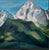 Charming oil on canvas painting of a serene mountain scene with spring flowers in foreground, signed lower right. Nice...