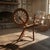 Handcrafted spinning wheels like this were essential household tools in early America, commonly produced in the late 18th...