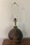 True vintage studio pottery lamp in the style of David Cressey. A beautifully formed lamp body with flame glaze sits on a...