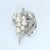 Mid 20th Century Pearl Cluster Brooch With Diamond-Encrusted Curved Bands For Sale - Image 4 of 5