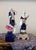 This is a beautiful pair of Royal Dux colonial figurines of a man and a woman playing instruments. Founded in 1860, these...