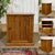 Early 20th century English 1-door sideboard in pitch pine - W=81cm, H=92cm, D=52cm.