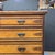 This beautiful Satinwood Arts & Crafts 5 Drawer Chest on Plinth Base with black line accents is a lovely example of the...