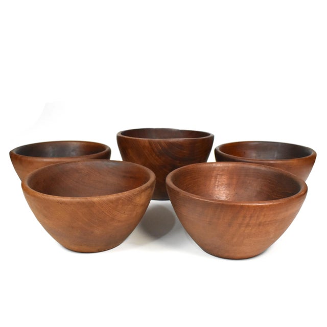 Set of 5 genuine teak wood carved bowls made by Dolphin in Thailand. Each bowl has unique natural wood patterns and colors...