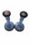 Elegant pair of circa 1930's glass candlesticks in a soft periwinkle blue hue, featuring a clean circular form and subtly...