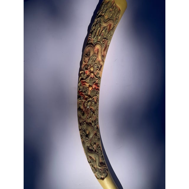 A striking vintage mid-century faux ivory decorative tusk cast in durable synthetic resin. Designed in the Chinoiserie...