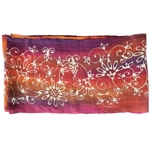 Offered is a narrow width hand designed floral batik on jewel toned ombre colors. The textile feels like a bark cloth,...
