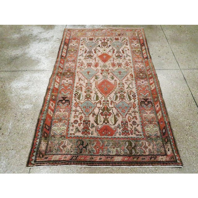 An antique Persian Malayer accent rug handmade during the early 20th century. Measures: 3' 10" x 6' 5"