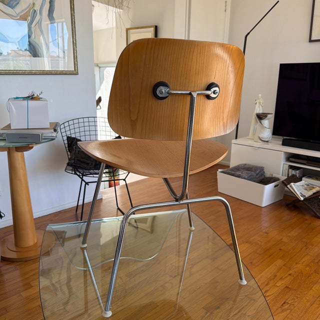 Set of 3 Mid-Century Modern Eames DCM Style Molded Plywood Dining Chairs. Purchased from a modern Scandinavian furniture...
