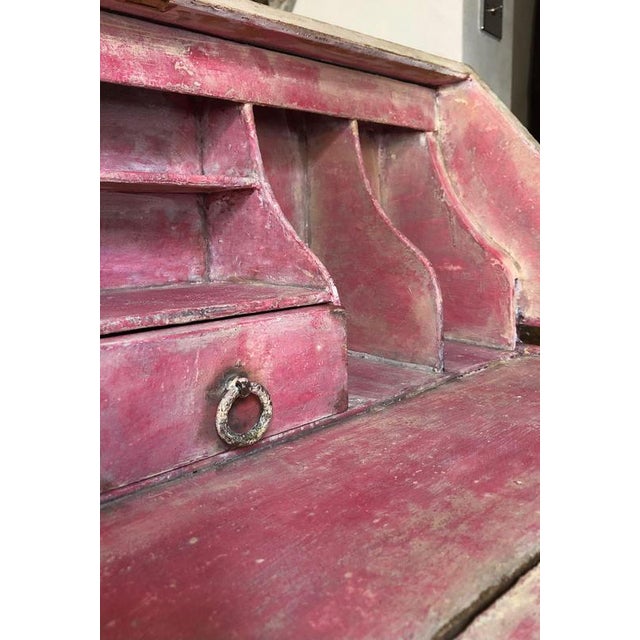 A 20th Century 1930s writing bureau painted in a traditional way with repeating floral patterns with a worn finish and...