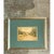 This vintage framed landscape presents a tranquil watercolor scene of a stone bridge spanning a gentle river, rendered in...
