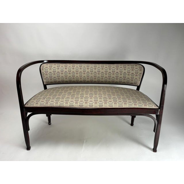 This sofa is an elegant example of Viennese Secession furniture, designed by Gustav Siegel around 1900 and produced by...