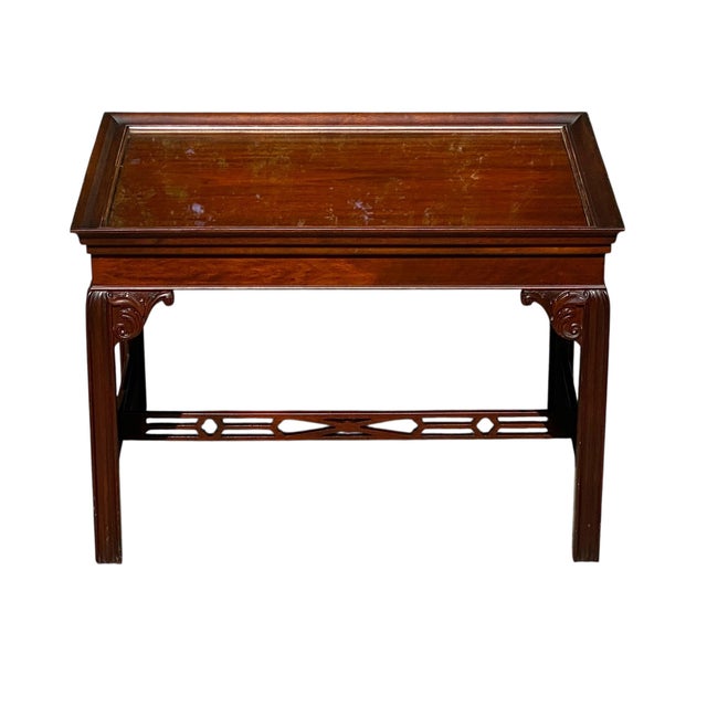 Bay Colony Antiques is pleased to offer for sale this wonderful vintage 20th century Mahogany coffee table / serving...