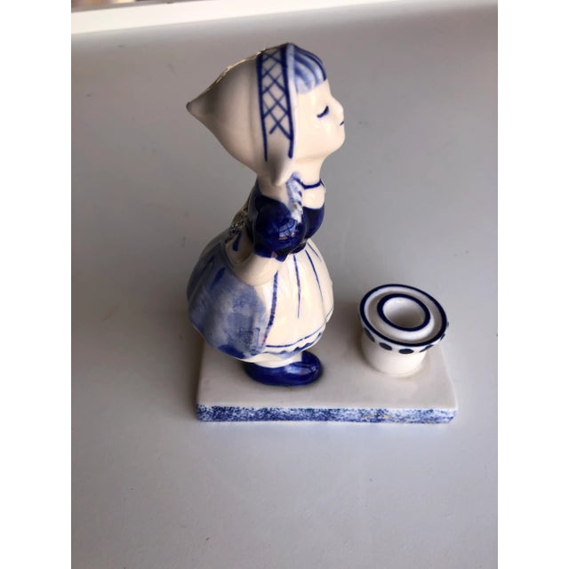 Vintage Blue and white Hand painted Dutch Girl figurine and candlestick 3.75"L X 2"D X 4.75"H makers mark reads "Hand...
