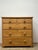 A quietly handsome piece of 19th-century English craftsmanship, this pine chest of drawers embodies the enduring appeal of...