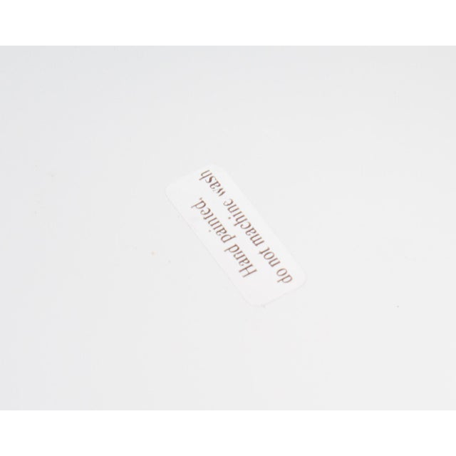 A glass "Serpentine" designed by Swedish designer Monica Backström (1939-2020) for Kosta Boda. Made in Sweden, this piece...