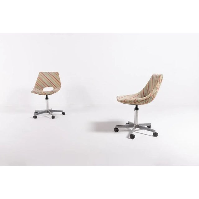 Pair of swivel desk chairs designed by Augusto Bozzi for Saporiti with five star leg, multicolour fabric seat upholstery....