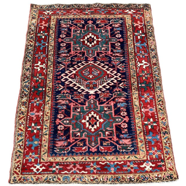A fabulous antique Karadja rug, woven circa 1900 in a difficult to find small size. The design features 3 geometrical...