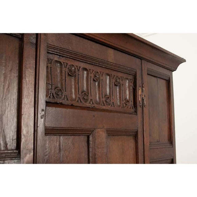 Dimensions: 72”H x 48-½”W x 15-⅛”D This handsome solid oak cabinet was crafted in 18th century England, functioning like a...