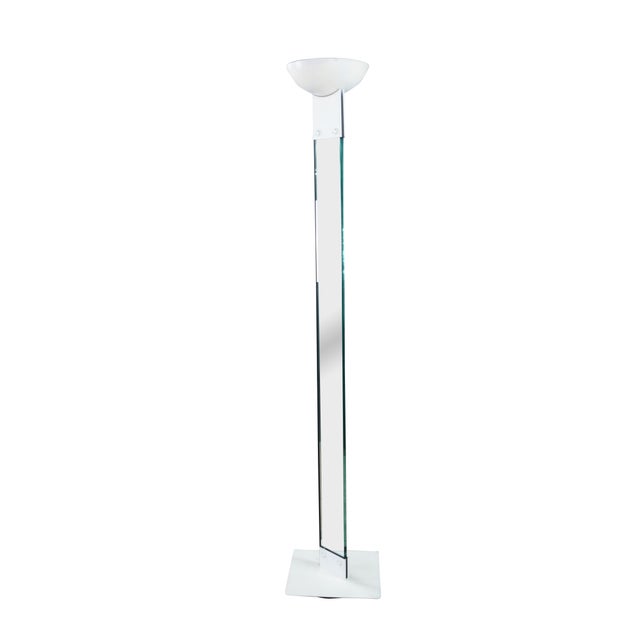 This 1980s Vintage Postmodern "Laser" Uplighter Floor Lamp is an iconic Italian design designed by Max Baguara for...