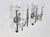 Pair of wall lamp sconces by the Italian designer Gaetano Sciolari, featuring a metal structure and glass decorations, two...