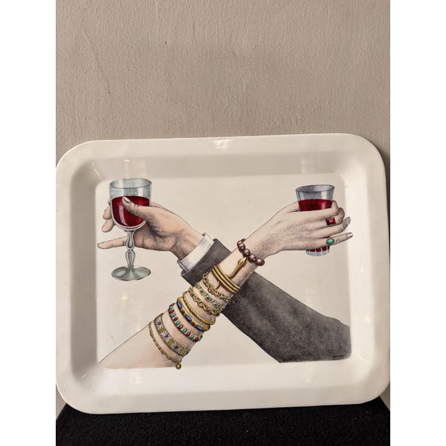 “Brindisi” Tray by Piero Fornasetti – Italy, 1950s A rare vintage tray by Piero Fornasetti, made in Italy in the 1950s,...