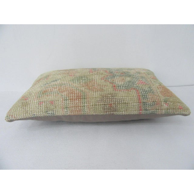 Decorative pillow cover made from a vintage Turkish handknotted rug. Backed with good quality cotton fabric. Pillow...